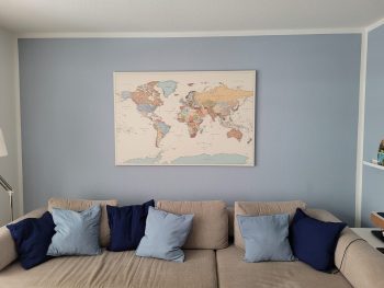 push-pin-world-map-customer-photo-colorful-on-blue-wall