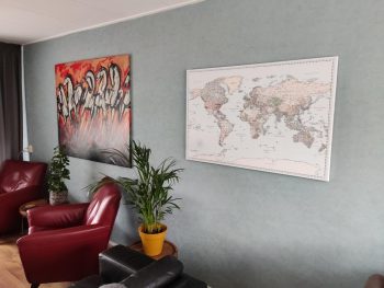 push-pin-world-map-customer-photo-retro-on-grey-wall